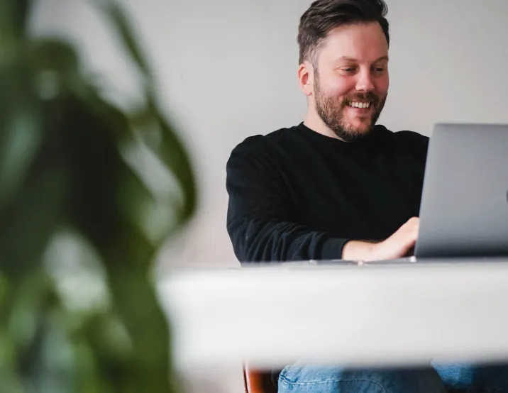 Dave Cartledge working on his Macbook